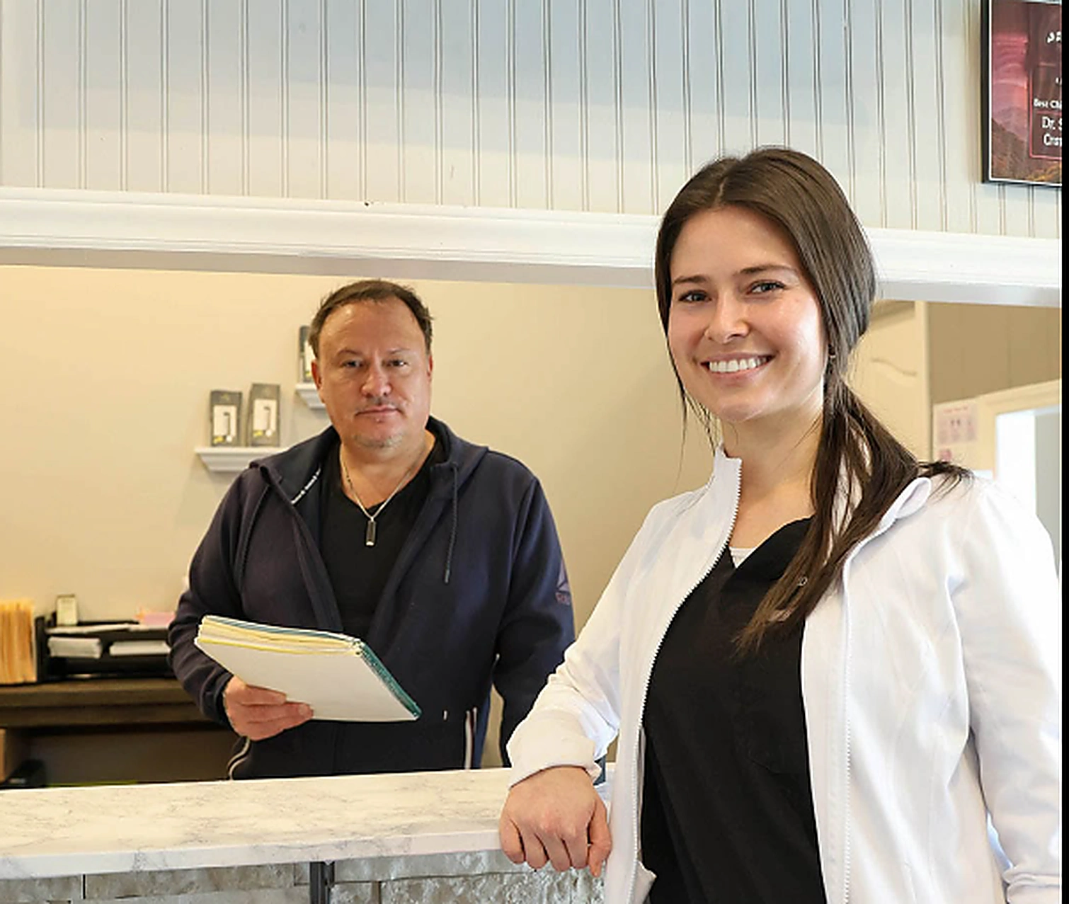 Dr. Shane and Dr. Sierra Cutshaw at the front desk