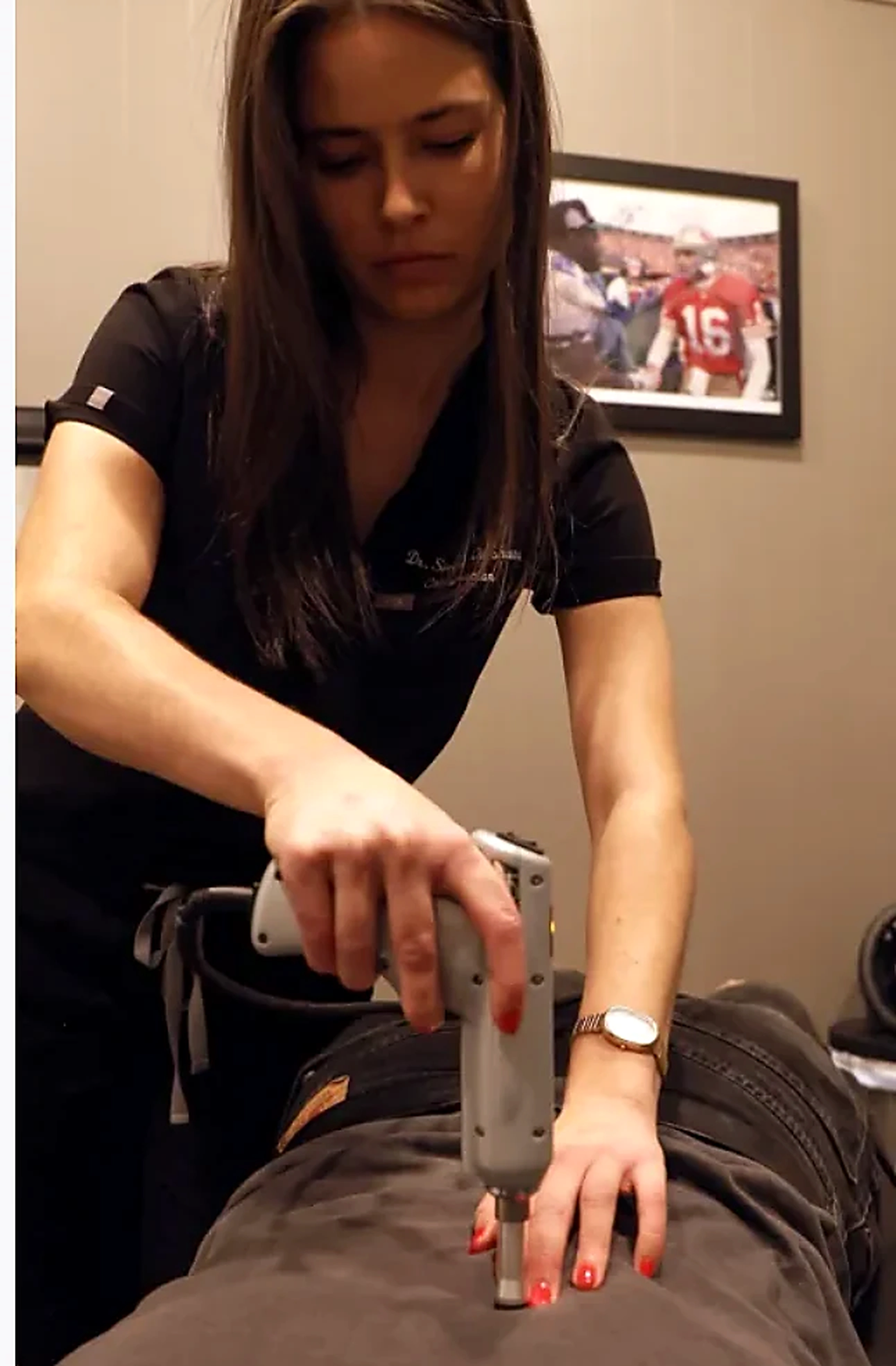 Dr. Sierra providing a treatment in the clinic